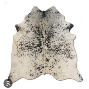 Tapis en peau de vache noir et blanc a