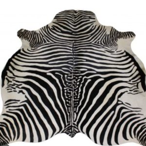 Tapis en peau de vache noir et blanc
